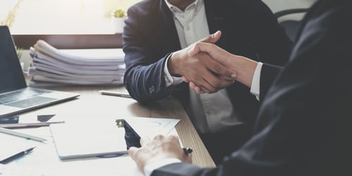 business-people-shaking-hands-finishing-up-meetin-2023-11-27-05-14-25-utc