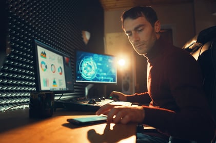 male-videographer-edits-and-cuts-footage-and-sound-2022-02-01-22-38-41-utc