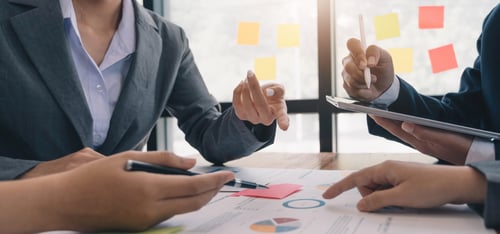 teamwork-with-business-people-analysis-cost-graph-2022-10-03-22-26-39-utc